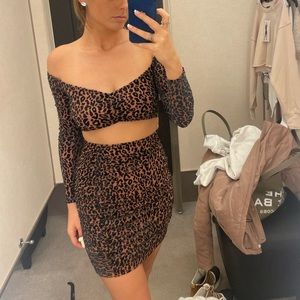 Naked wardrobe leopard dress
